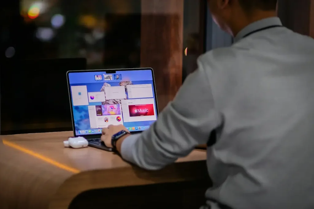 A Man Using His MacBook Pro 