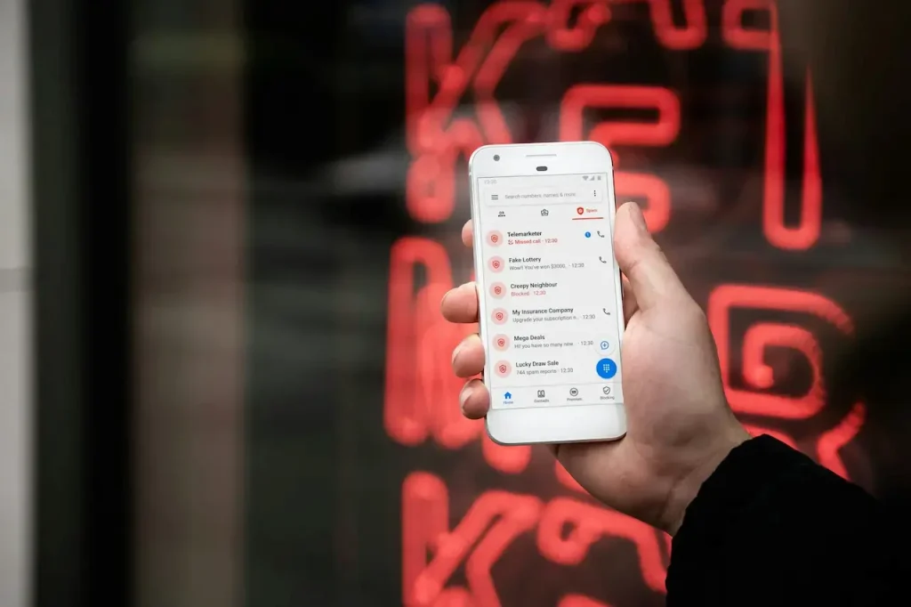 Person Receiving Spam Calls on Their Phone 