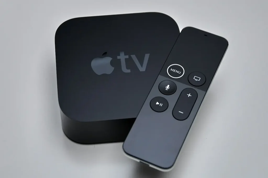 A Black Apple TV Box and its Remote