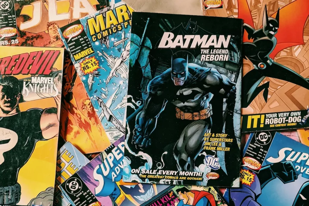 A Set of Comic Books with Batman and Other Heroes