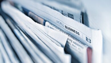 Newspaper and digital technology representing Australia news bargaining debate