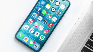 Smartphone held in hand showing screen