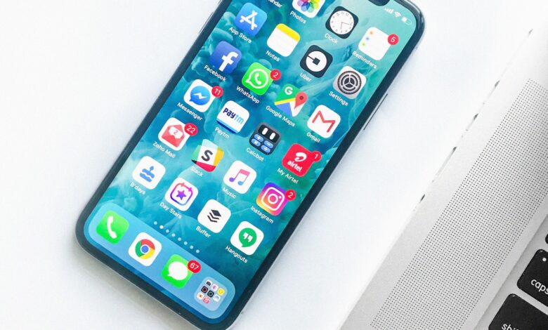 Smartphone held in hand showing screen