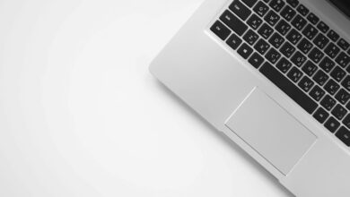 MacBook Pro laptop resting on a white surface