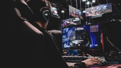 Multi-monitor gaming desk setup with 4K displays