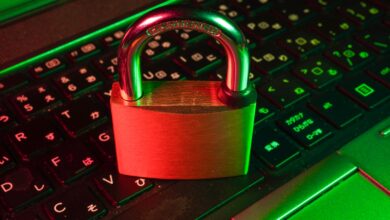 Red padlock on a laptop keyboard symbolising a ransomware attack