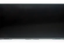 Nintendo Switch 2 console in handheld mode with Joy-Con controllers attached, screen off