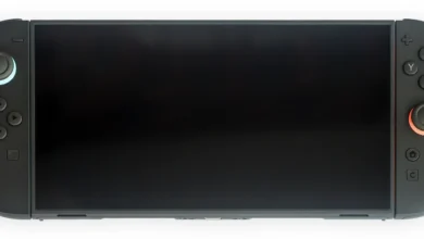 Nintendo Switch 2 console in handheld mode with Joy-Con controllers attached, screen off