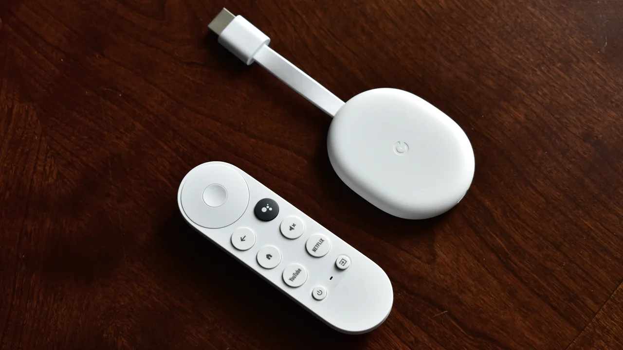 A television remote control resting near a streaming device in an Australian lounge room