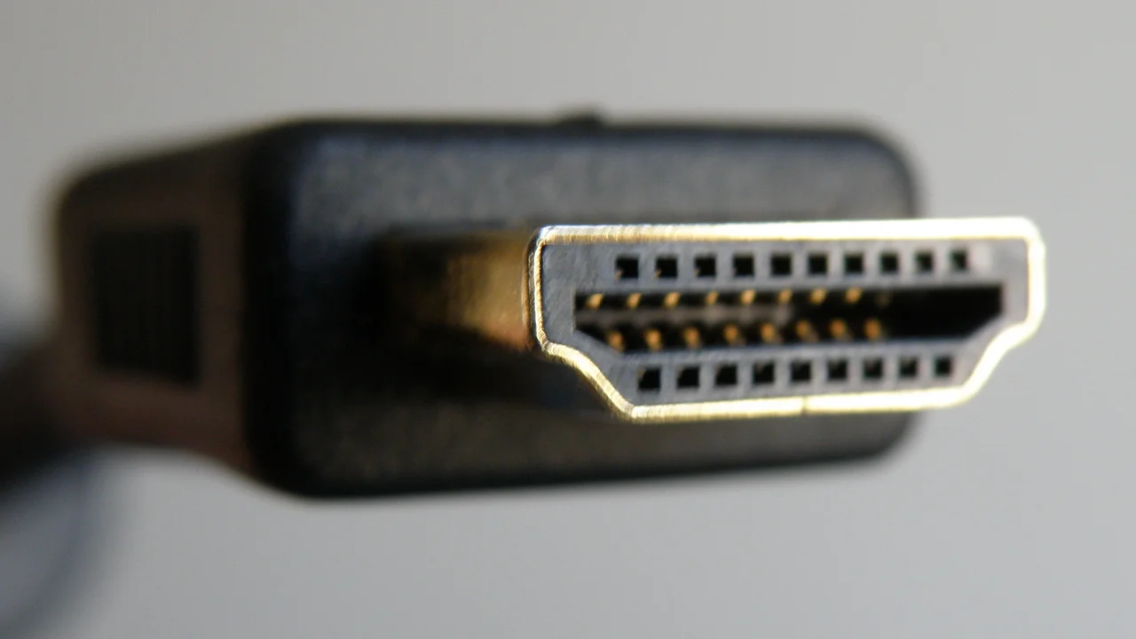 Close-up of HDMI ports on the back of a modern television used for a gaming setup
